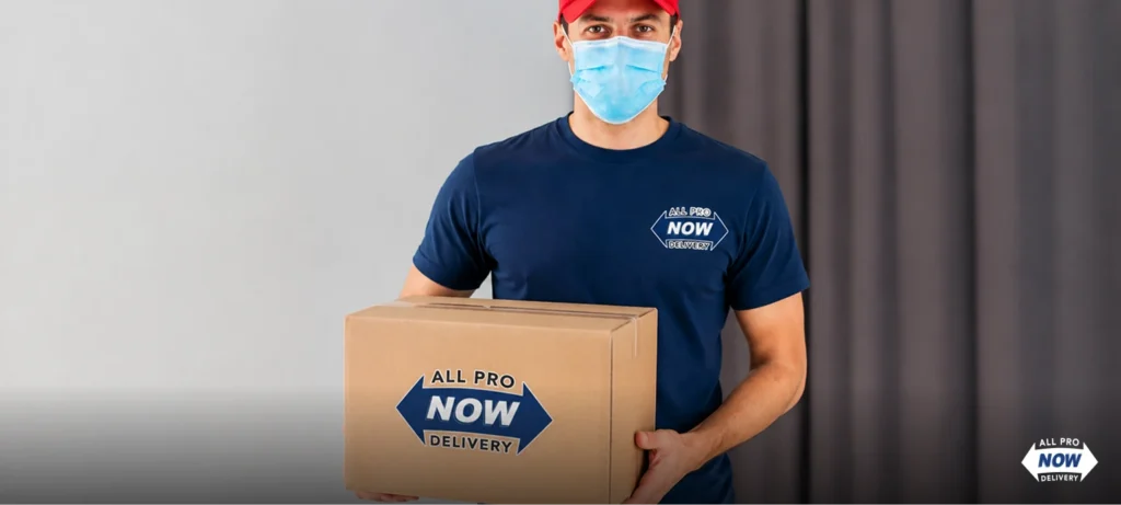 AllProNow driver in face mask holding branded delivery box for safe no contact delivery